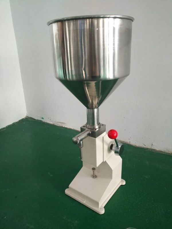 A03 Manual Máquina de enchimento de garrafas de creme de geleia pasta de suco pasta de dentes loção de mel óleo líquido máquina de enchimento